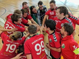 Phönix Leipzig motiviert sich im Kreis für die nächsten Aufgaben auf dem Floorballfeld